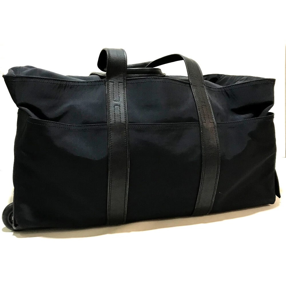 HERMES 2WAY ACAPULCO TRAVEL BAG CARRY BAG: HERMES 2WAY Acapulco Travel Bag Carry Bag Brand: HERMES Type/Style: Carry bag Duffle Bag Material: Nylon / Leather Color: Black Size: W22.0xH12.0xD12.2inch / W56cmxH30.5cmxD31cm Handle: 20.5inch / 52c