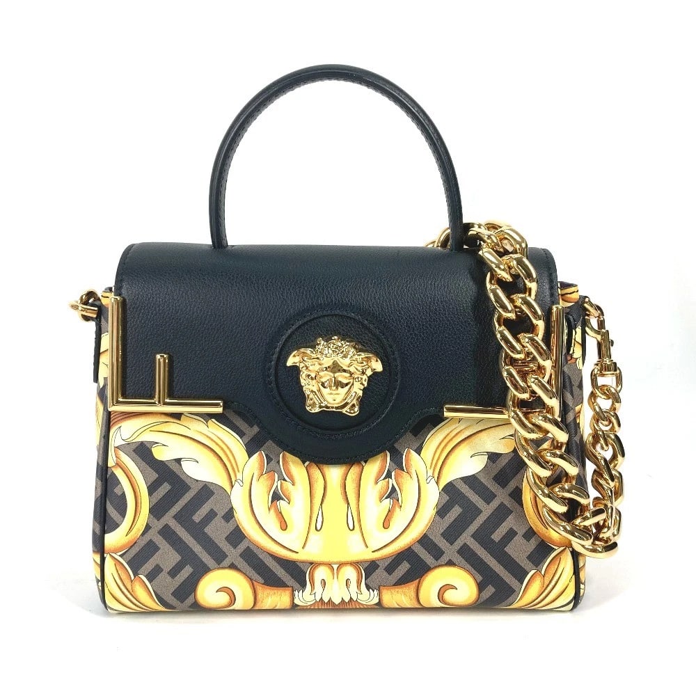 FENDI LA MEDUSA SATCHEL BAG: FENDI la medusa satchel bag Brand: FENDI Type/Style: Hand Bag Material: PVC/ Leather Color: Brown x Black Size: W9.8xH7.7xD4.7inch / W25cmxH19.5cmxD12cm Accessories: None Accessories Notic