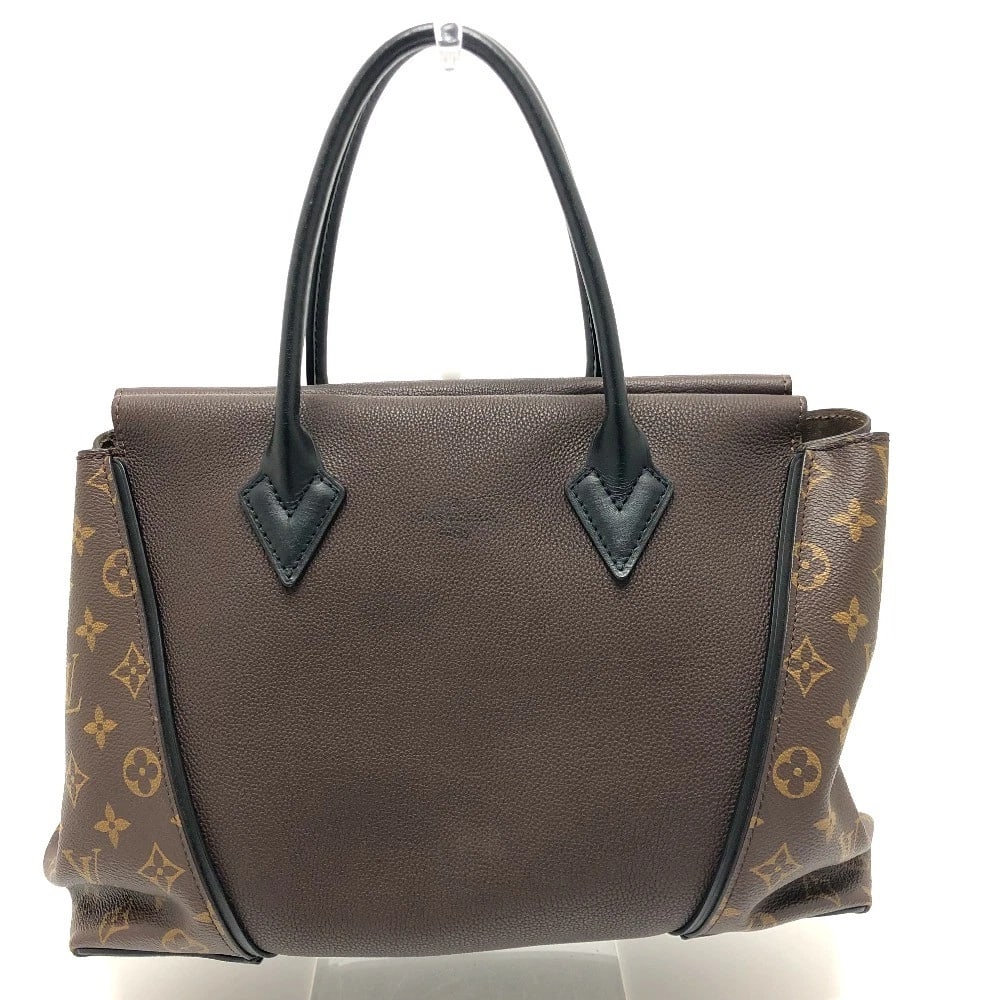 LOUIS VUITTON MONOGRAM TOTE W PM HAND BAG: LOUIS VUITTON Monogram Tote W PM Hand Bag Brand: Louis Vuitton Type/Style: Hand Bag Material: MonogramCanvas / Cuir - Orfevre Leather Color: Chocolate/Brown Size: W13.4xH9.1xD4.9inch / W34cmxH23cmxD12