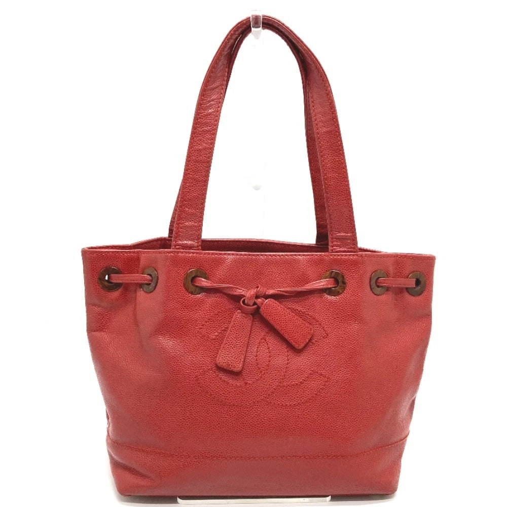 CHANEL CC WOOD-LIKE DRAWSTRING TYPE TOTE BAG: CHANEL CC Wood-like drawstring type Tote Bag Brand: CHANEL Type/Style: Tote Bag Material: Caviar Leather Color: Red Size: W10.6xH9.6xD4.7inch / W27cmxH24.5cmxD12cm Accessories: None Access