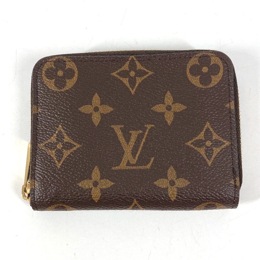 LOUIS VUITTON MONOGRAM ZIP-AROUND COIN PURSE WALLET: LOUIS VUITTON Monogram Zip-around coin purse wallet Brand: LOUIS VUITTON Type/Style: coin purse Material: Monogram Canvas Color: Brown Size: W4.3xH3.3inch / W11cmxH8.5cm Accessories: None