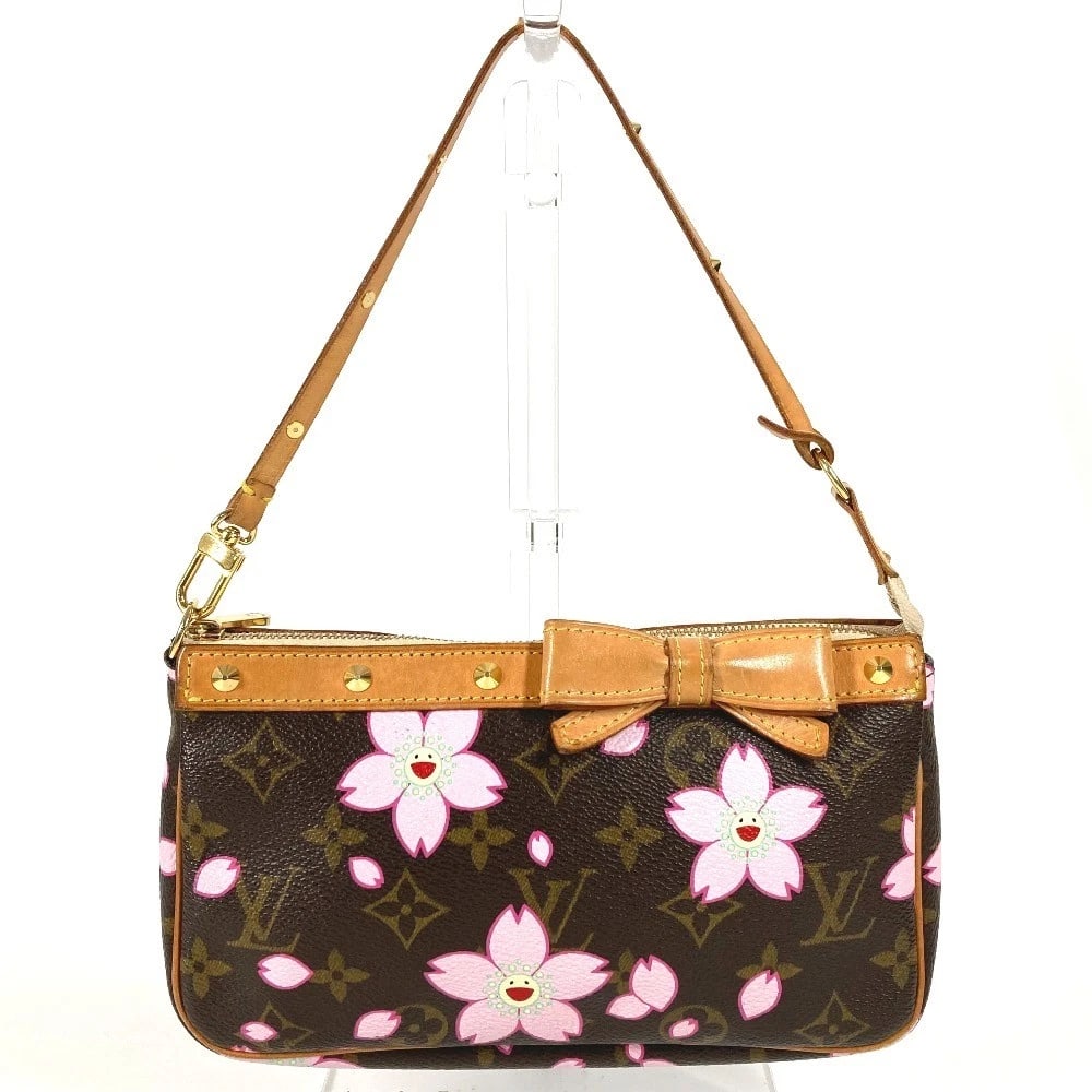 LOUIS VUITTON MONOGRAM POCHETTEACCESSOIRES MINI HAND BAG: LOUIS VUITTON Monogram PochetteAccessoires Mini Hand Bag Brand: Louis Vuitton Type/Style: Hand Bag Material: Monogram Canvas Color: Brown/ pink Size: W8.3xH4.7xD1.4inch / W21cmxH12cmxD3.5cm Access