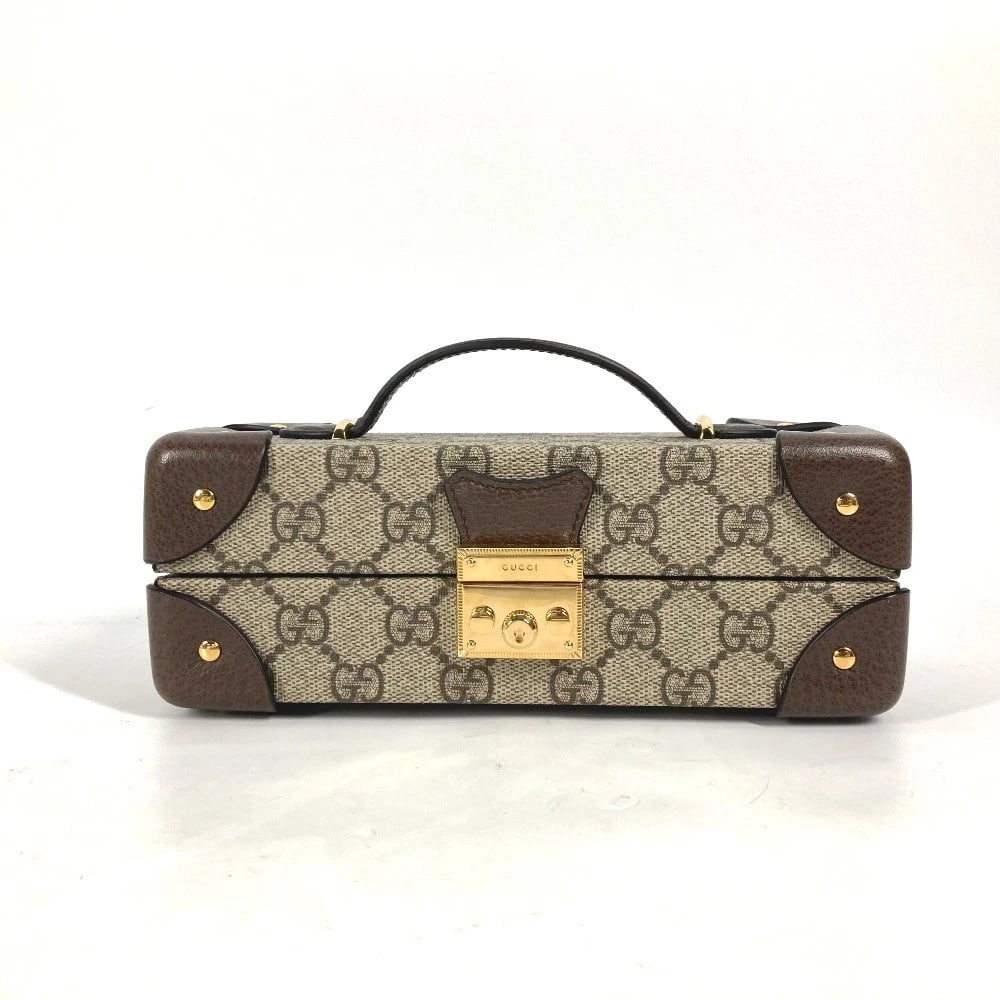 GUCCI GG SUPREME PADLOCK CASE HAND BAG: GUCCI GG Supreme Padlock Case Hand Bag Brand: GUCCI Type/Style: Hand Bag Material: GG Supreme Canvas / Leather Color: BeigexDark brown Size: W7.9xH3.0xD3.5inch / W20cmxH7.5cmxD9cm Accessories: Non
