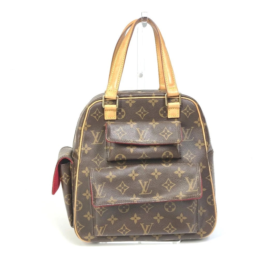 LOUIS VUITTON MONOGRAM EXSANTRI CITE TOTE BAG: LOUIS VUITTON Monogram Exsantri Cite Tote Bag Brand: LOUIS VUITTON Type/Style: Hand Bag Material: Monogram Canvas Color: Brown Size: W9.4xH9.8xD4.7inch / W24cmxH25cmxD12cm Accessories: None