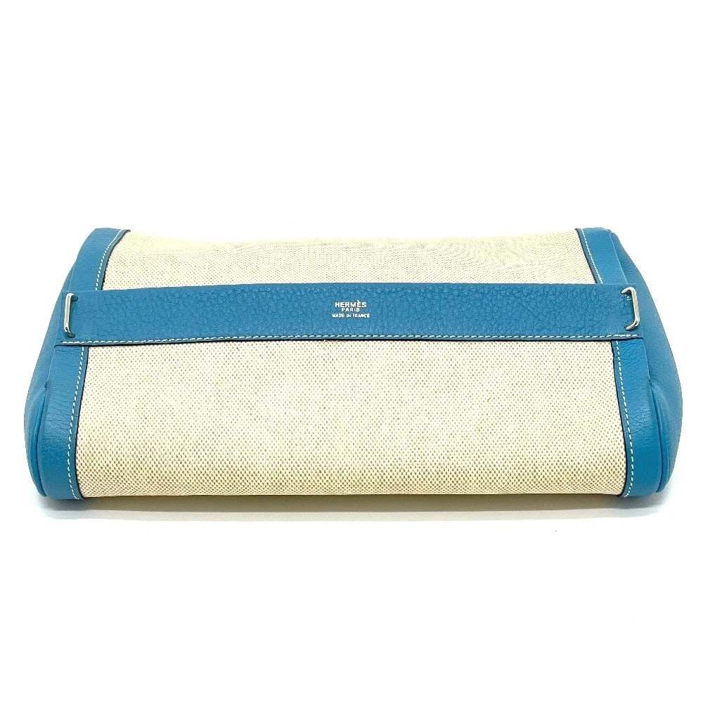 HERMES EQUI POUCH CLUTCH BAG TOILE: HERMES Equi Pouch Clutch bag Toile Brand: HERMES Type/Style: Clutch bag Material: Toile H / Taurillon Clece Color: Blue Size: W10.6xH7.4xD2.3inch / W26.8cmxH18.7cmxD5.8cm Accessories: None