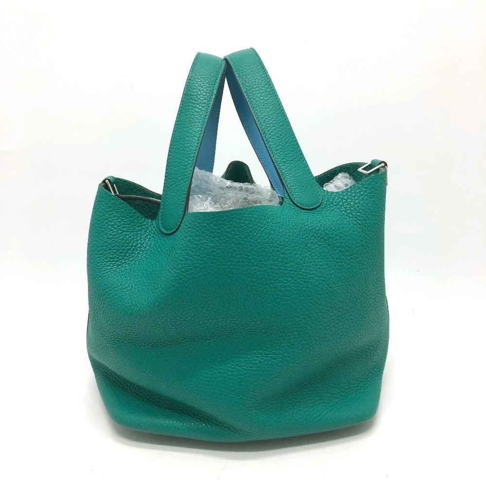 HERMES PICOTINLOCK ECLAT 22 BICOLOR HAND BAG: HERMES PicotinLock Eclat 22 Bicolor Hand Bag Brand: HERMES Type/Style: Hand Bag Material: Taurillon Clece Color: Green/SilverHardware Size: W8.7xH8.3xD6.9inch / W22cmxH21cmxD17.5cm Accessories: None