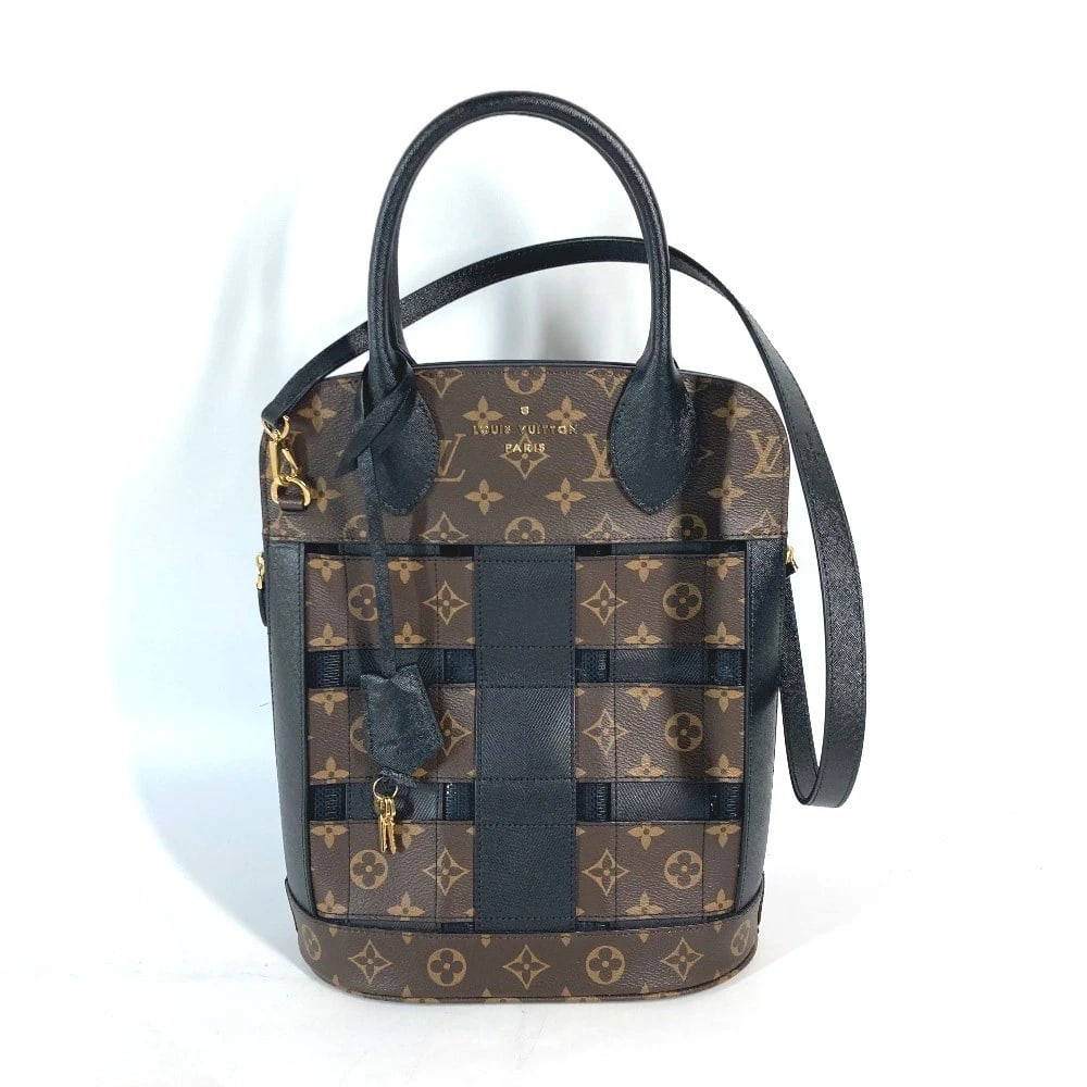 LOUIS VUITTON MONOGRAM TRACEAGE-TOTE SHOULDER BAG: LOUIS VUITTON Monogram Traceage-Tote Shoulder Bag Brand: LOUIS VUITTON Type/Style: Tote Bag Material: MonogramCanvas Color: Brown / Black Size: W9.6xH12.4xD5.5inch / W24.5cmxH31.5cmxD14cm Accessor