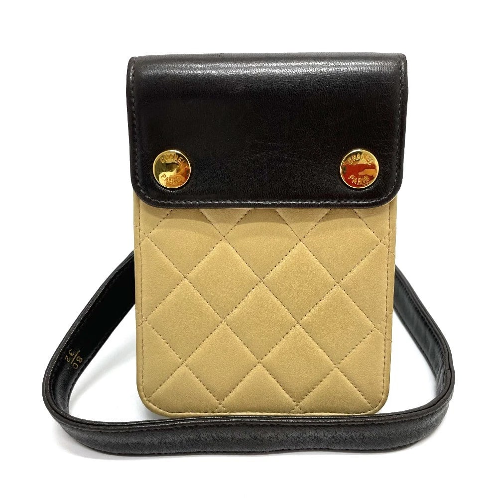 CHANEL MATELASSE BICOLOR POUCH POCHETTE SHOULDER BAG: CHANEL Matelasse Bicolor Pouch Pochette Shoulder Bag Brand: CHANEL Type/Style: Waist Pouch Material: Lambskin Leather Color: Black x BeigexGoldHardware Size: W4.4xH6.3xD2.0inch / W11.2cmxH16cmxD5cm