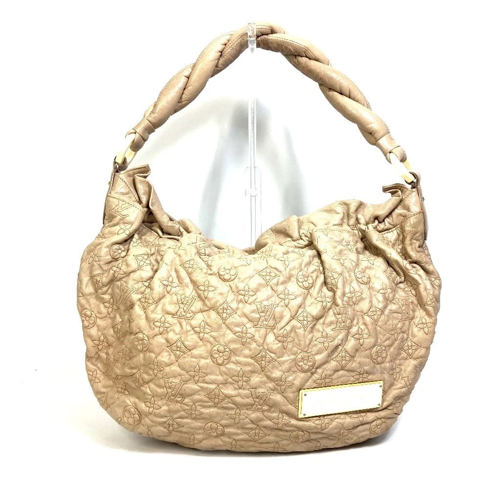 LOUIS VUITTON MONOGRAM O LAMP NIMBS GM SHOULDER BAG: LOUIS VUITTON Monogram o lamp Nimbs GM Shoulder Bag Brand: LOUIS VUITTON Type/Style: Shoulder Bag Material: Leather Color: Ecru / biege Size: W17.1xH12.2xD3.9inch / W43.5cmxH31cmxD10cm Accessories: