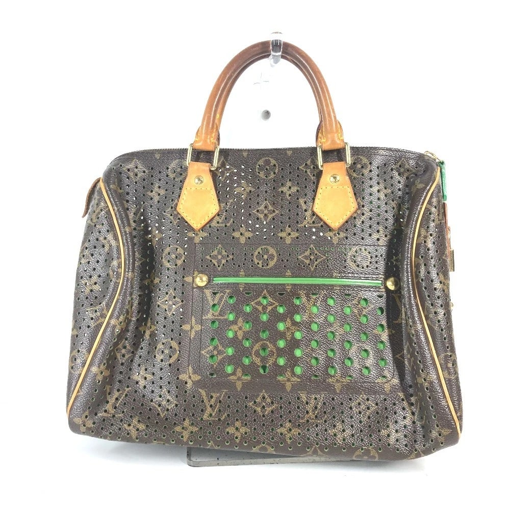 LOUIS VUITTON MONOGRAMPERFO SPEEDY30 HAND BAG: LOUIS VUITTON MonogramPerfo Speedy30 Hand Bag Brand: LOUIS VUITTON Type/Style: Hand Bag Material: MonogramCanvas Color: Vert / Green / Brown Size: W11.8xH7.7xD6.5inch / W30cmxH19.5cmxD16.5cm Acces