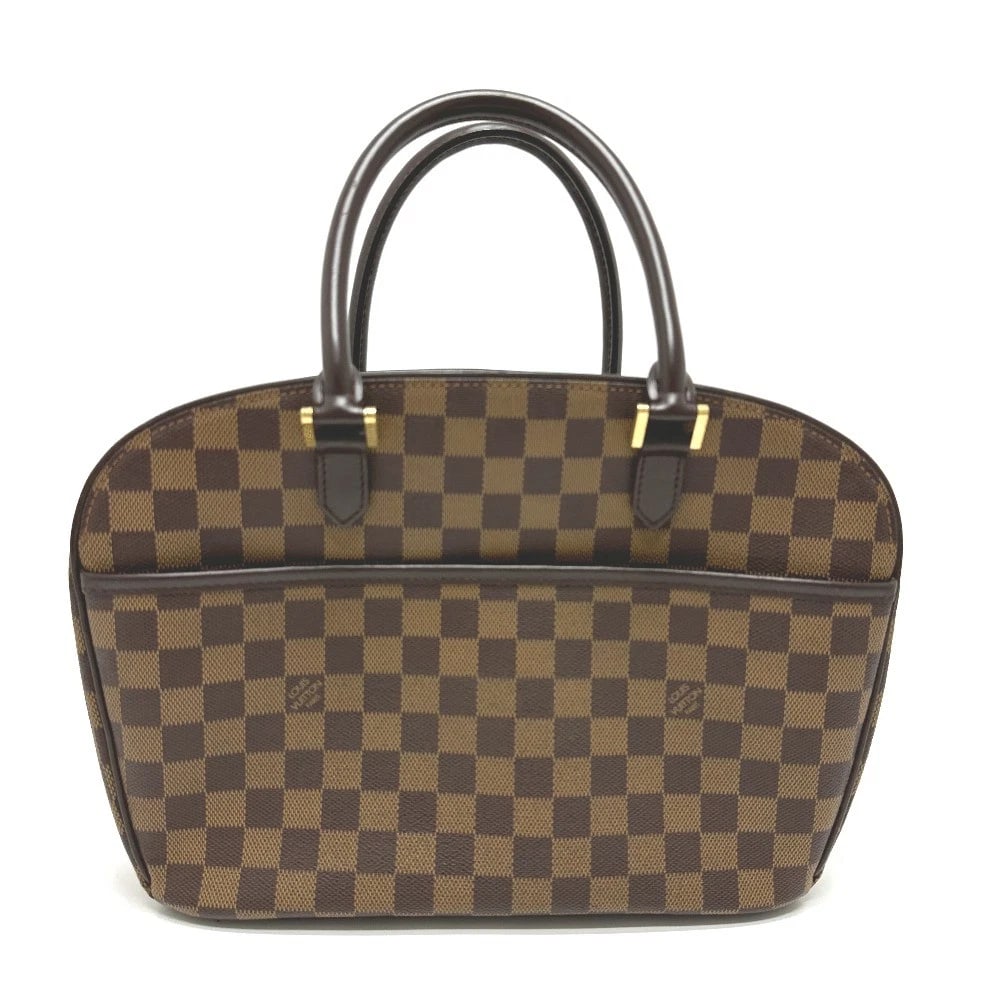 LOUIS VUITTON DAMIER SARIA HORIZONTAL BAG HAND BAG: LOUIS VUITTON Damier Saria Horizontal Bag Hand Bag Brand: LOUIS VUITTON Type/Style: Hand Bag Material: Damier Canvas Color: Ebene / Brown Size: W11.8xH9.8xD3.7inch / W30cmxH25cmxD9.5cm Handle: 15.0inc