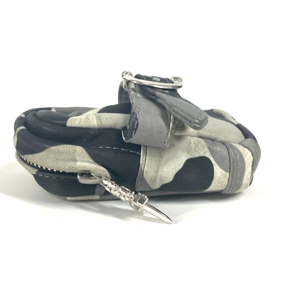 CHROME HEARTS WRISTHER BACK PACK CAMOUFLAGE POUCH BRACELET: CHROME HEARTS WRISTHER BACK PACK Camouflage Pouch Bracelet Brand: CHROME HEARTS Type/Style: Pouch Material: Leather Color: gray Size: W2.8xH3.5inch / W7cmxH9cm Accessories: None Accessorie