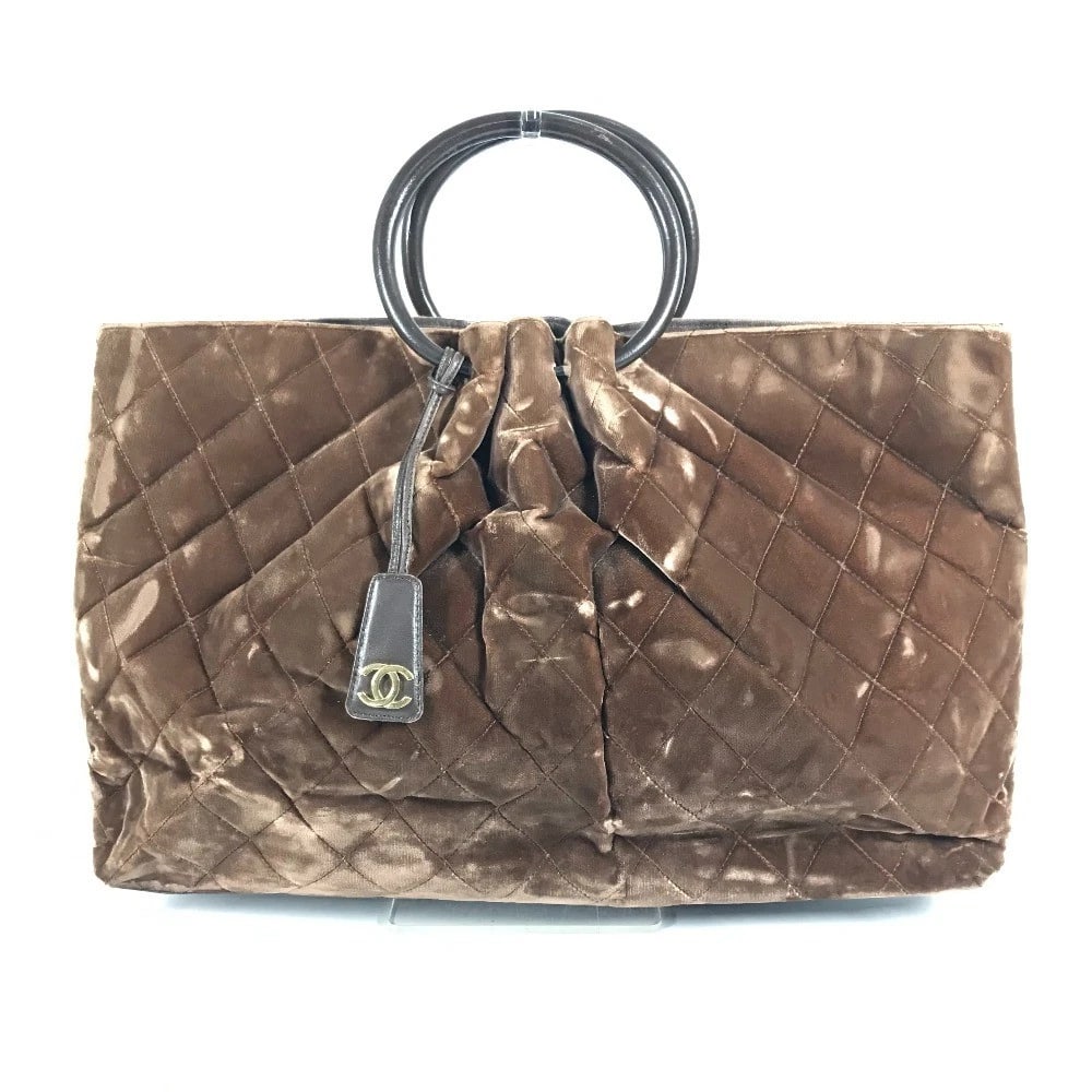 CHANEL ROUND HANDLE CC CC MARK LOGO QUILTED MATELASSE BAG: CHANEL round handle CC CC Mark Logo Quilted Matelasse Bag Brand: CHANEL Type/Style: Hand Bag Material: Velor Color: Brown Size: W18.9xH11.8xD3.1inch / W48cmxH30cmxD8cm Accessories: None Ac