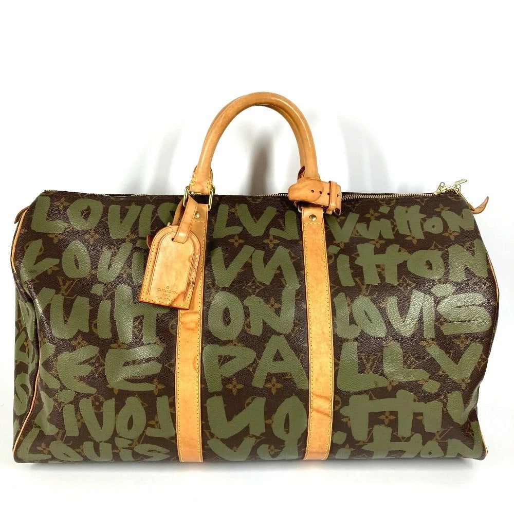 LOUIS VUITTON MONOGRAMGRAFFITI KEEPALL 50 HAND BAG: LOUIS VUITTON MonogramGraffiti Keepall 50 Hand Bag Brand: Louis Vuitton Type/Style: Duffle Bag Material: Monogram GraffitiCanvas Color: khaki /Brown Size: W20.1xH11.0xD8.5inch / W51cmxH28cmxD21.5cm