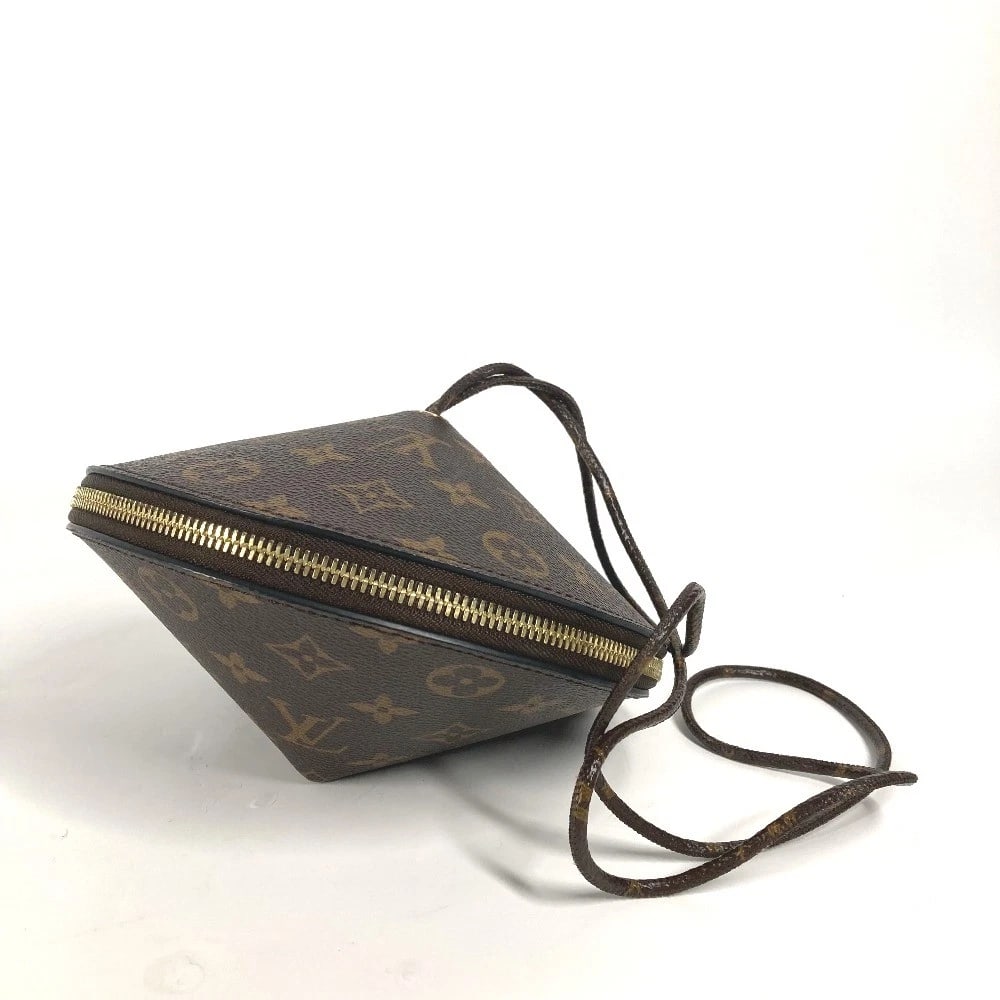 LOUIS VUITTON MONOGRAM TUPI PARTY BAG: LOUIS VUITTON Monogram Tupi Party Bag Brand: LOUIS VUITTON Type/Style: Hand Bag Material: Monogram Canvas Color: Brown Size: W6.9xH6.9inch / W17.5cmxH17.5cm Accessories: None Accessories Notice: When