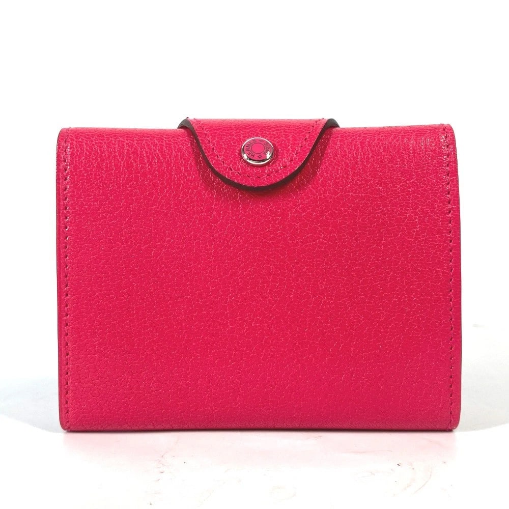 HERMES SERIE ILIAD COMPACT COIN PURSE WALLET: HERMES Serie Iliad Compact coin purse wallet Brand: HERMES Type/Style: Folded wallet Material: Chevre Color: pinkxSilverHardware Size: W3.9xH3.1inch / W10cmxH8cm Accessories: None Accessor
