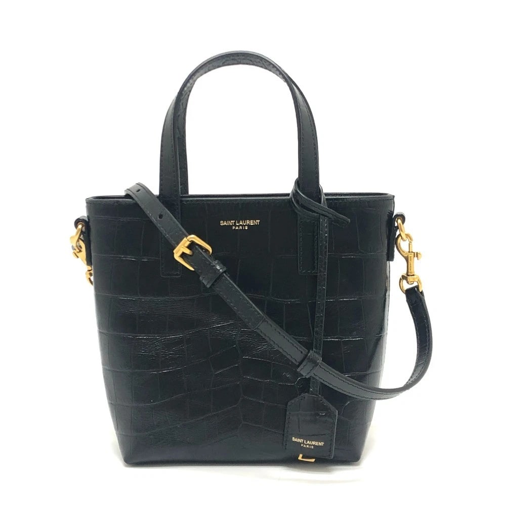 SAINT LAURENT PARIS LOGO MINI SHOPPING BAG: SAINT LAURENT PARIS Logo Mini Shopping Bag Brand: SAINT LAURENT PARIS Type/Style: Hand Bag Material: Embossed Leather Color: Black Size: W5.9xH6.7xD2.8inch / W15cmxH17cmxD7cm Handle: 9.1inch / 23cm Sh