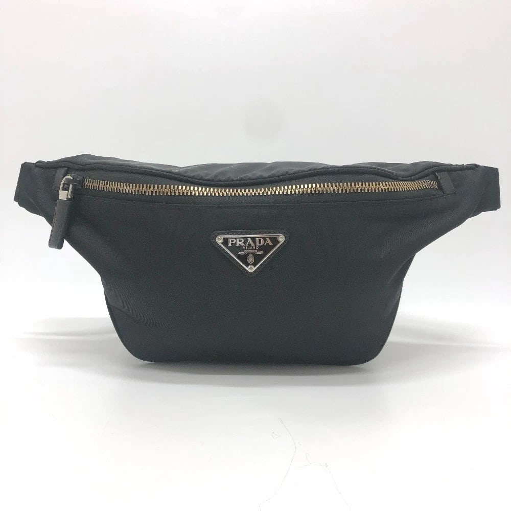 PRADA TRIANGLE PLATE WAIST POUCH BAG BODY BAG: PRADA triangle plate Waist Pouch Bag body bag Brand: PRADA Type/Style: body bag Material: Nylon Color: Black Size: W12.6xH5.5xD37.4inch / W32cmxH14cmxD95cm Accessories: None Accessories No
