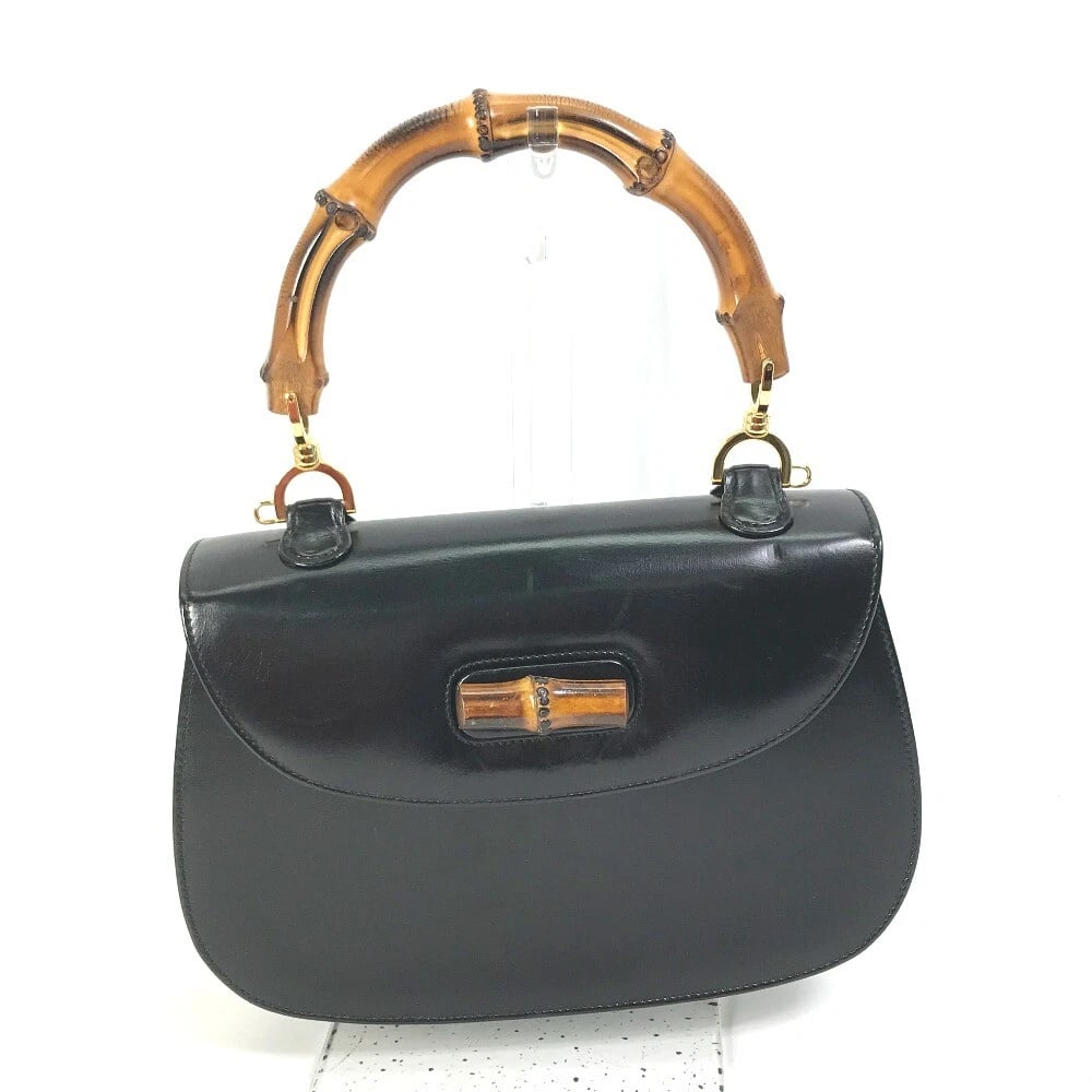 GUCCI TURN LOCK OLD GUCCI BAMBOO TOP HANDLE BAG: GUCCI turn lock old gucci Bamboo top handle bag Brand: GUCCI Type/Style: Hand Bag Material: Leather / Bamboo Color: Black Size: W9.3xH6.7xD2.6inch / W23.5cmxH17cmxD6.5cm Accessories: None