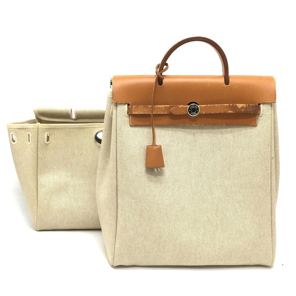 HERMES HERBAG ADO PM 2WAY HAND BAG BACKPACK-BAG: HERMES Herbag Ado PM 2WAY Hand Bag Backpack-Bag Brand: HERMES Type/Style: Backpack Material: Leather / ToileGM Color: Beige / SilverHardware Size: W11.1xH12.6xD5.3inch / W28.2cmxH32cmxD13.5cm Handle: 