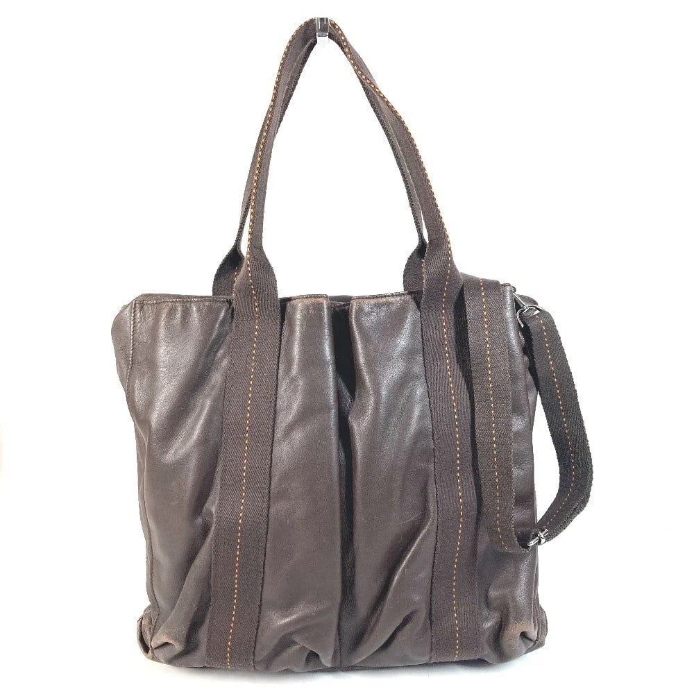 HERMES VERTICAL HANDBAG CARAVAN VERTICAL MM CROSSBODY TOTE BAG: HERMES Vertical Handbag Caravan Vertical MM Crossbody Tote Bag Brand: HERMES Type/Style: Shoulder Bag Material: Leather Color: Brown /Orange Size: W14.6xH13.8xD1.6inch / W37cmxH35cmxD4cm Accessori