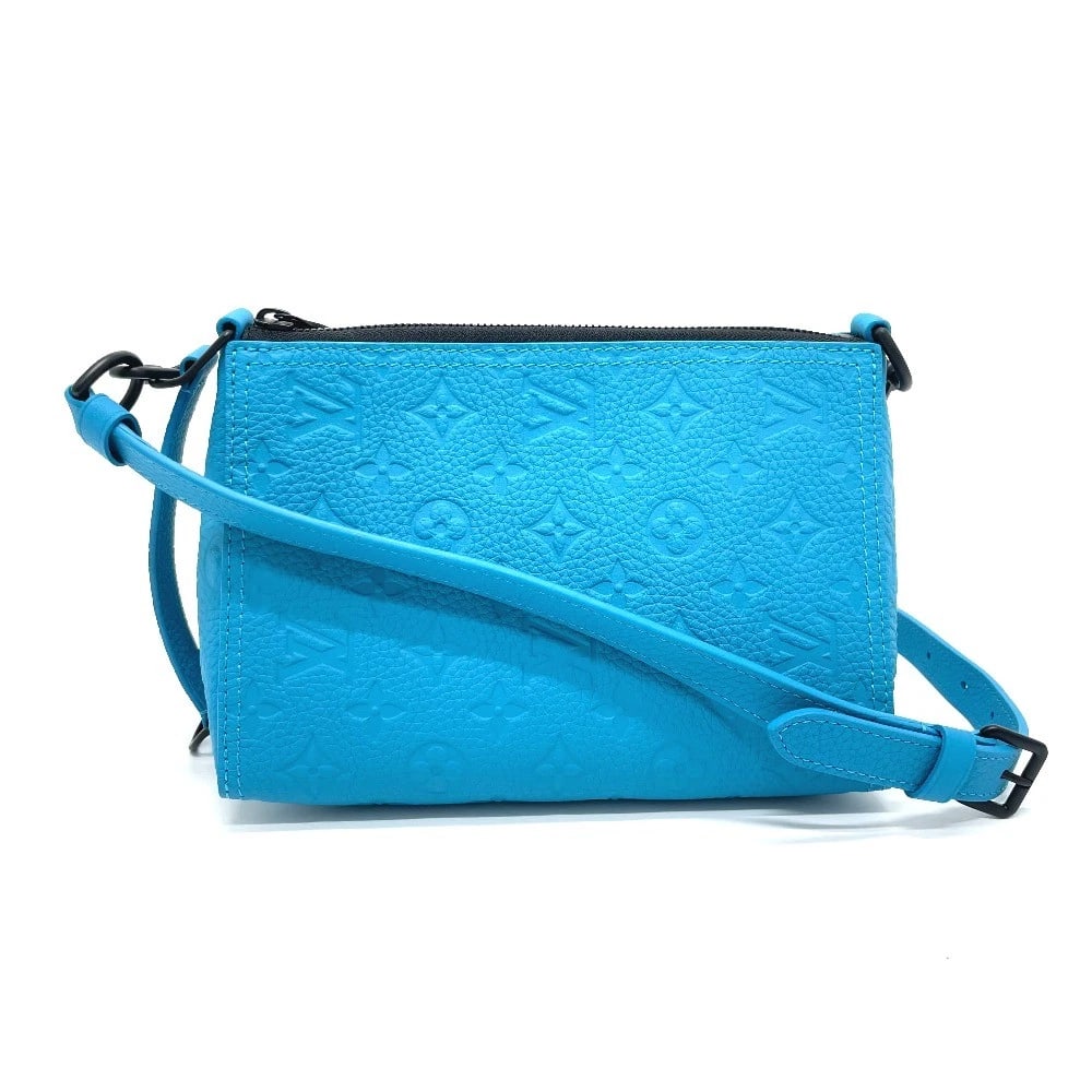 LOUIS VUITTON MONOGRAM EMPREINTE SHOULDER BAG: LOUIS VUITTON Monogram Empreinte Shoulder Bag Brand: LOUIS VUITTON Type/Style: Shoulder Bag Material: MonogramEmpreinteLeather Color: Turquoise / blue Size: W8.7xH5.9xD5.5inch / W22cmxH15cmxD14cm Hand