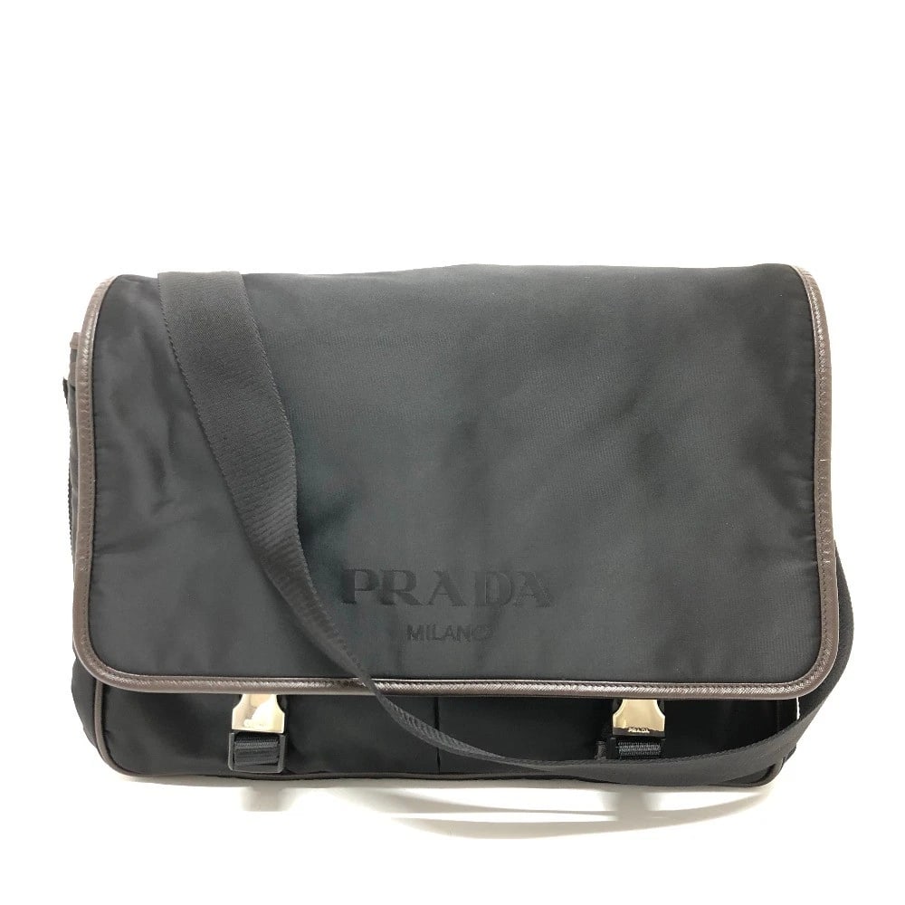 PRADA VA0793 MESSENGER BAG BAG: PRADA VA0793 Messenger bag Bag Brand: PRADA Type/Style: Shoulder Bag Material: Nylon Color: BlackxBrown/SilverHardware Size: W13.8xH9.8xD5.5inch / W35cmxH25cmxD14cm Accessories: None Acces