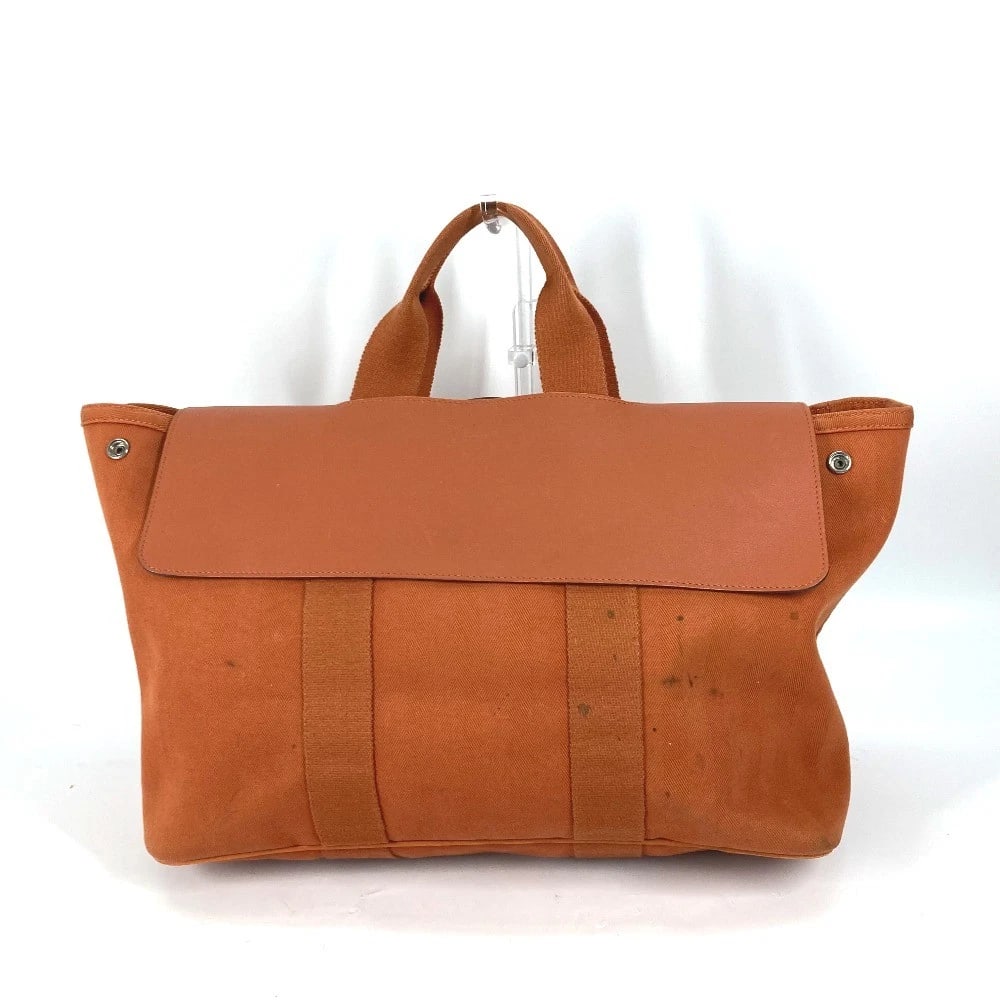 HERMES BAG HAND BAG VALPARAISO MM WITH PORCH TOTE BAG: HERMES Bag Hand Bag Valparaiso MM With porch Tote Bag Brand: HERMES Type/Style: Tote Bag Material: Canvas /Leather Color: Orange Size: W16.1xH11.0xD6.9inch / W41cmxH28cmxD17.5cm Accessories: None