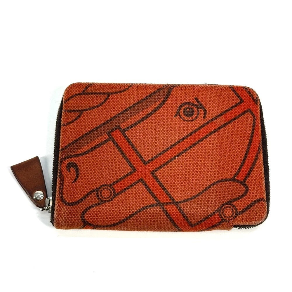 HERMES HORSE STEEPLE PM COMPACT WALLET ZIP: HERMES Horse Steeple PM Compact Wallet Zip Brand: HERMES Type/Style: Folded wallet Material: Canvas Color: Orange Size: W5.3xH3.9inch / W13.5cmxH10cm Accessories: None Accessories Notice: