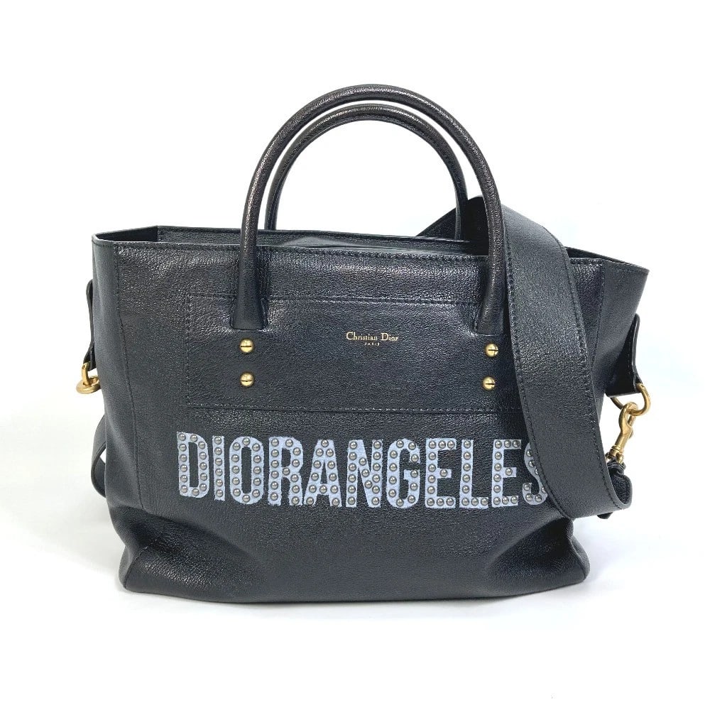 CHRISTIAN DIOR LOGO STUDS DIORANGELS 2WAY TOTE BAG: Christian Dior Logo studs DIORANGELS 2WAY Tote Bag Brand: Christian Dior Type/Style: Tote Bag Material: Leather Color: Black Size: W14.6xH12.8xD6.5inch / W37cmxH32.5cmxD16.5cm Accessories: None