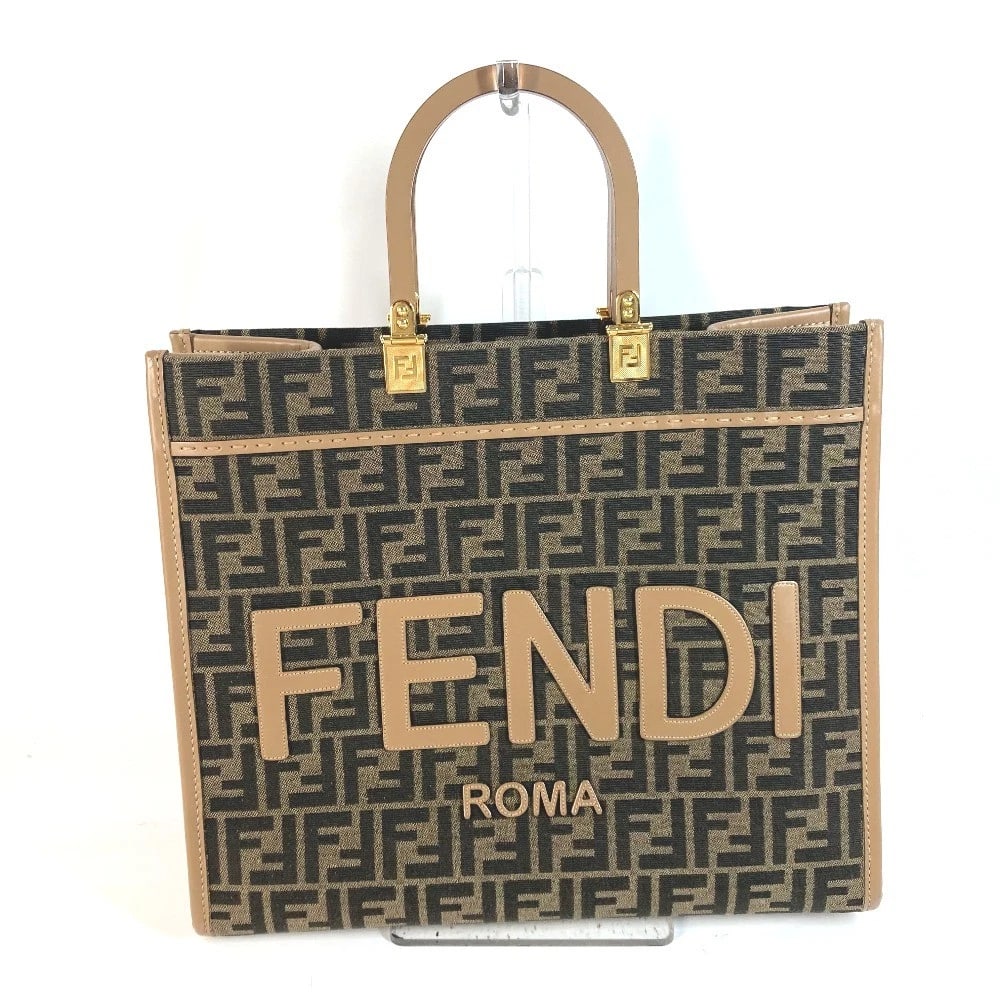 FENDI SUNSHINE MEDIUM TOTE BAG TOTE BAG SHOULDER BAG: FENDI Sunshine Medium Tote Bag Tote Bag Shoulder Bag Brand: FENDI Type/Style: Shoulder Bag Material: Leather/Canvas Color: Brown Size: W13.8xH11.8xD5.9inch / W35cmxH30cmxD15cm Accessories: None