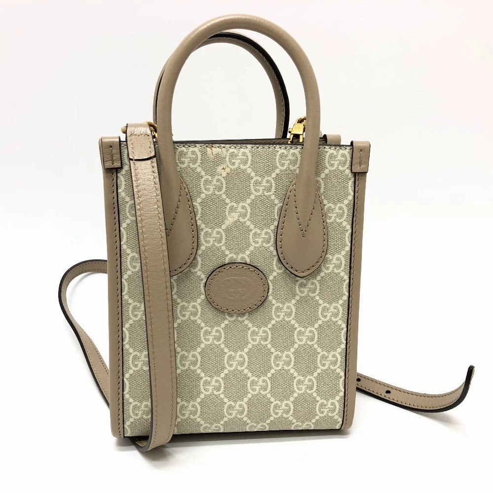 GUCCI GG SUPREME INTERLOCKING G MINI TOTE BAG: GUCCI GG Supreme Interlocking G Mini Tote Bag Brand: GUCCI Type/Style: Shoulder Bag Material: GG Supreme Canvas Color: Light Beige Size: W6.3xH7.9xD2.8inch / W16cmxH20cmxD7cm Handle: 10.2inch / 26cm