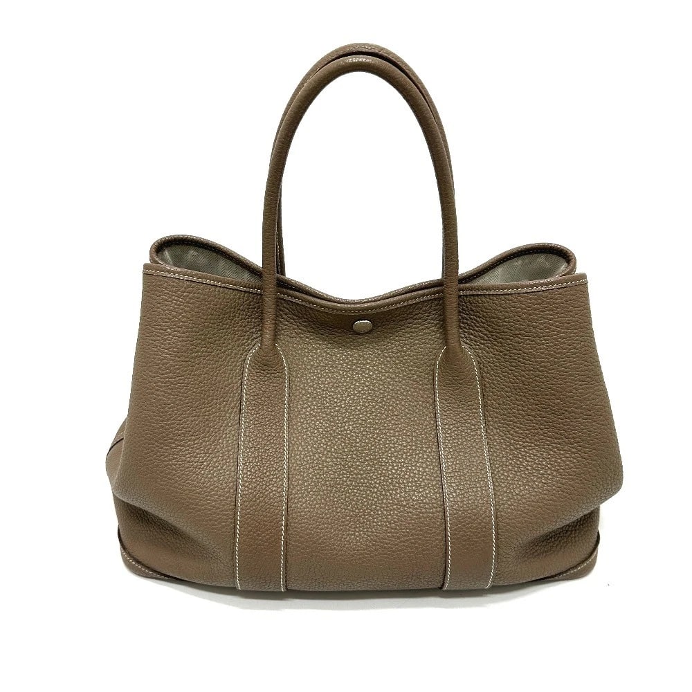 HERMES GARDEN PARTY PM HAND BAG TOTE BAG: HERMES Garden Party PM Hand Bag Tote Bag Brand: HERMES Type/Style: Tote Bag Material: Negonda Color: Beige x Silver Hardware Size: W14.2xH9.8xD6.7inch / W36cmxH25cmxD17cm Handle: 17.7inch / 45cm A