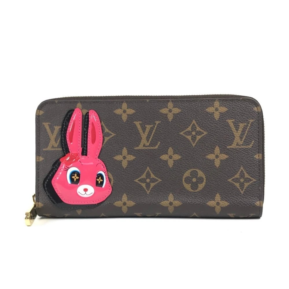 LOUIS VUITTON MONOGRAM NICOLAS GHESQUIERE ZIPPY-WALLET: LOUIS VUITTON Monogram Nicolas Ghesquiere Zippy-wallet Brand: LOUIS VUITTON Type/Style: Long Wallet Material: Monogram Canvas Color: Brownxpink Size: W7.7xH3.9inch / W19.5cmxH10cm Accessories: None