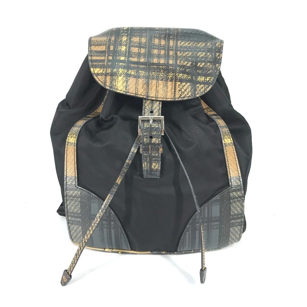 PRADA TRIANGLE LOGO PLATE CHECK BACKPACK BAG: PRADA triangle logo plate check backpack bag Brand: PRADA Type/Style: Backpack Material: Nylon / Leather Color: Black x Beige Based Size: W10.2xH11.6xD5.9inch / W26cmxH29.5cmxD15cm Accessories: None