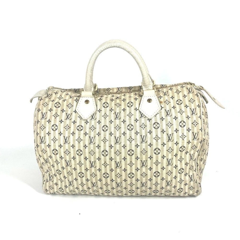 LOUIS VUITTON MONOGRAM MINI-LIN SPEEDY30 HAND BAG: LOUIS VUITTON Monogram Mini-Lin Speedy30 Hand Bag Brand: LOUIS VUITTON Type/Style: Hand Bag Material: Monogram Mini-LinCanvas Color: WhiteBased/Navy Based Size: W12.0xH7.7xD6.3inch / W30.5cmxH19.5cmxD