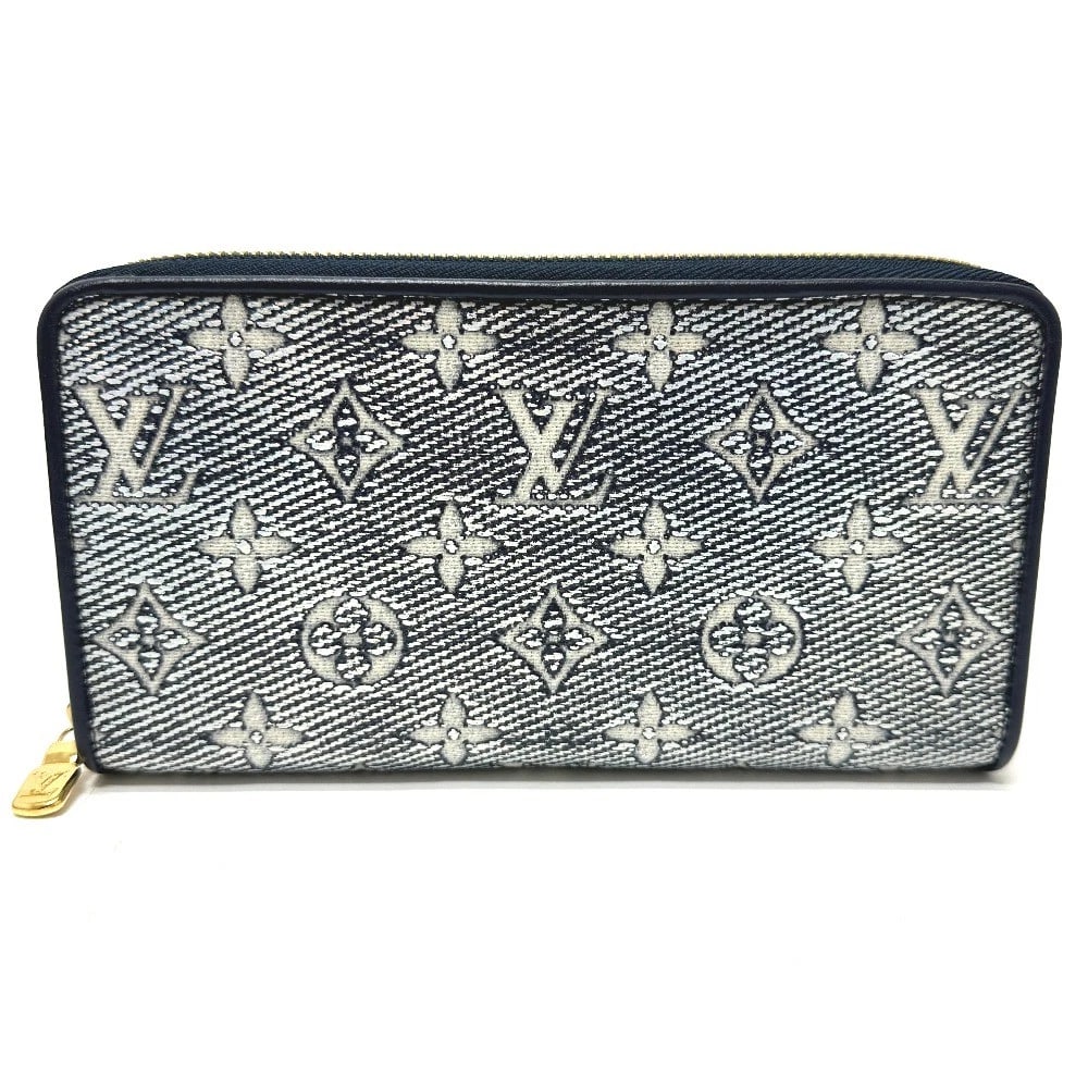 LOUIS VUITTON MONOGRAM JACQUARD ZIPPY WALLET: LOUIS VUITTON Monogram jacquard Zippy Wallet Brand: LOUIS VUITTON Type/Style: Long Wallet Material: fabric / Monogram jacquard Color: Navy Size: W7.7xH3.9xD1.2inch / W19.5cmxH10cmxD3cm Accessories: