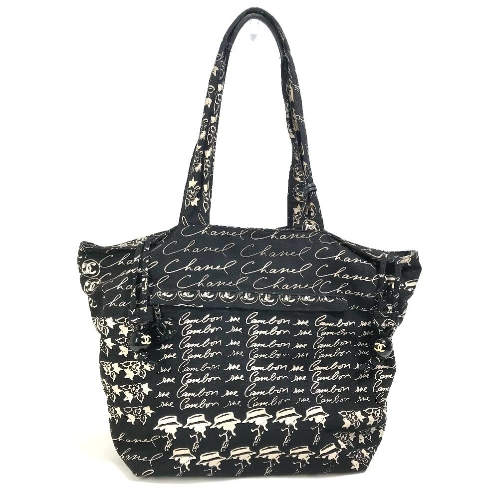 CHANEL CAMELLIA LOGO BUCKET DRAWSTRING SHOULDER BAG: CHANEL Camellia Logo Bucket Drawstring Shoulder Bag Brand: CHANEL Type/Style: Tote Bag Material: Canvas Color: Black x Beige Based Size: W11.2xH13.0xD7.3inch / W28.5cmxH33cmxD18.5cm Accessories: N
