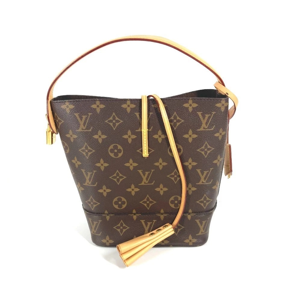LOUIS VUITTON MONOGRAM PM IDOL PM BUCKET-SHAPED HAND BAG: LOUIS VUITTON Monogram PM Idol PM Bucket-shaped Hand bag Brand: Louis Vuitton Type/Style: Hand Bag Material: MonogramCanvas Color: Brown Size: W6.5xH8.5xD3.9inch / W16.5cmxH21.5cmxD10cm Accessorie