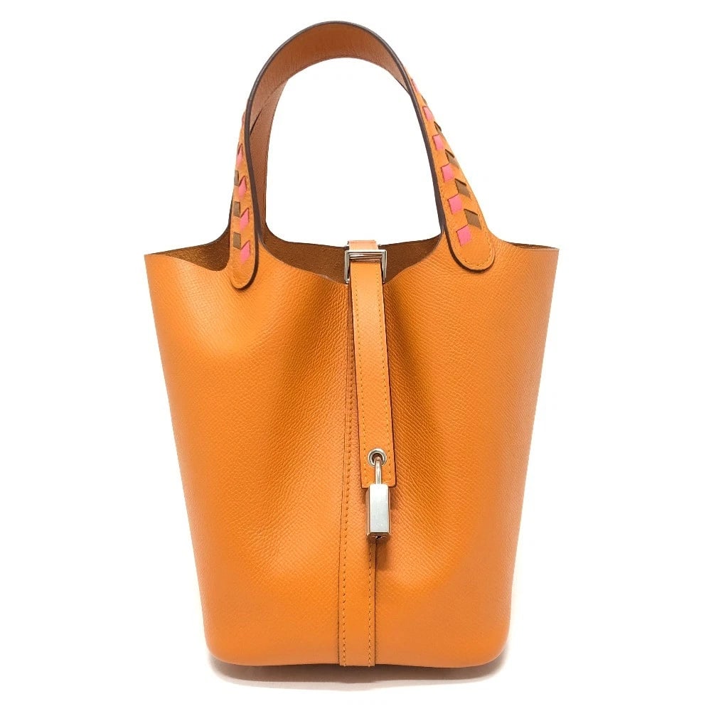 HERMES PICOTIN ROCK PM TRESAGE PM HAND BAG: HERMES Picotin Rock PM Tresage PM Hand Bag Brand: HERMES Type/Style: Hand Bag Material: Epsom Color: Orange x Silver Hardware Size: W5.1xH7.5xD7.1inch / W13cmxH19cmxD18cm Handle: 12.2inch / 31cm A