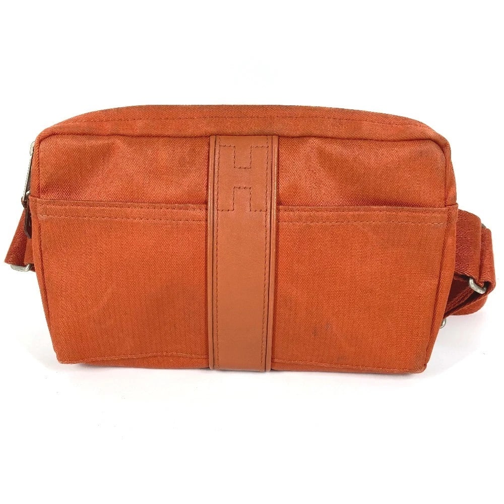 HERMES ACAPULCO CEINTURE CROSSBODY BAG SHOULDER BAG: HERMES Acapulco Ceinture Crossbody Bag Shoulder Bag Brand: HERMES Type/Style: body bag Material: polyamide / cotton Color: Orange Size: W8.9xH5.3xD1.4inch / W22.5cmxH13.5cmxD3.5cm Accessories: Non