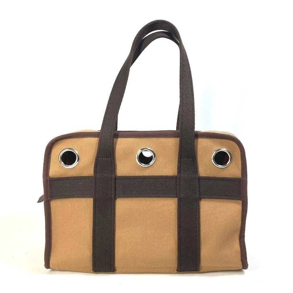 HERMES PET DOG TOTE BAG: HERMES Pet Dog Tote Bag Brand: HERMES Type/Style: Duffle Bag Material: Nylon / cotton / Polyurethane Color: Brown Size: W13.8xH9.4xD5.9inch / W35cmxH24cmxD15cm Accessories: None Accessorie