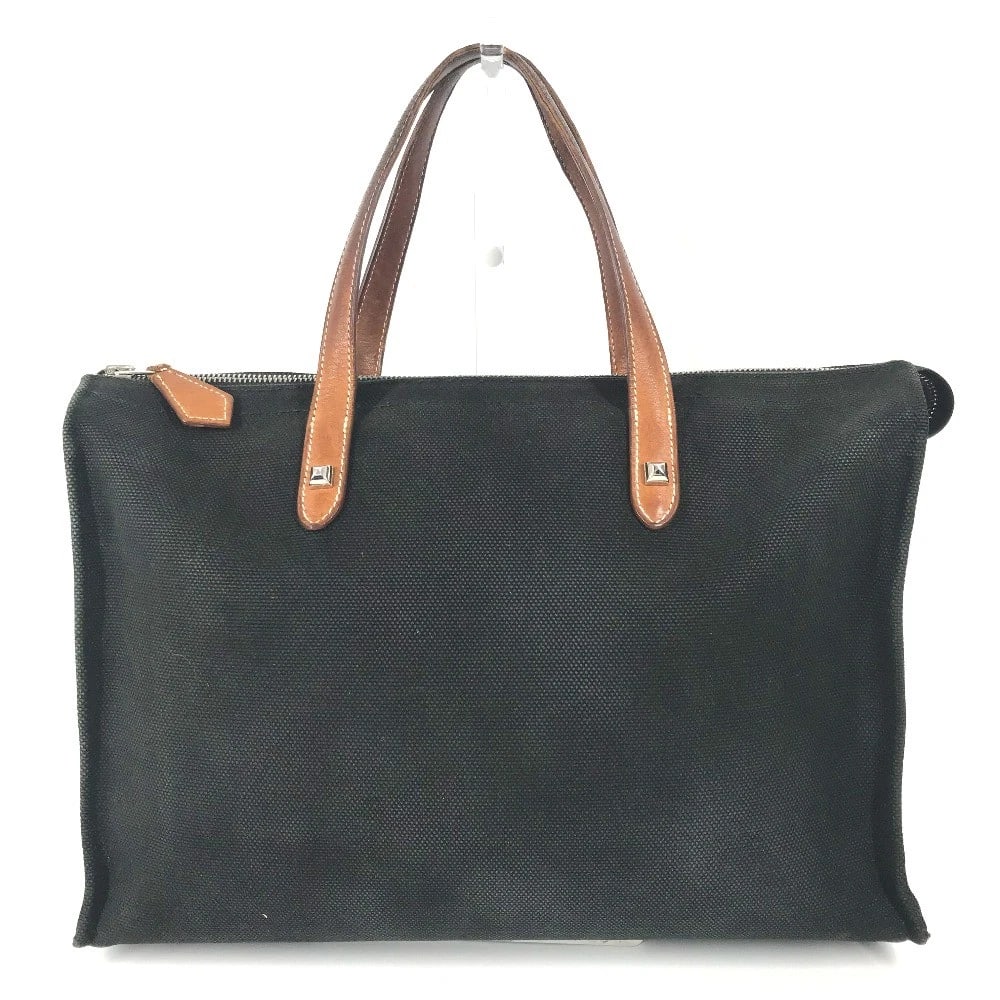 HERMES MEDALL STUDS BRIEFCASE BAG TOTE BAG: HERMES Medall studs Briefcase Bag Tote Bag Brand: HERMES Type/Style: Business bag Material: Canvas/Leather Color: Black / Brown Size: W14.0xH10.2xD4.1inch / W35.5cmxH26cmxD10.5cm Accessories: None