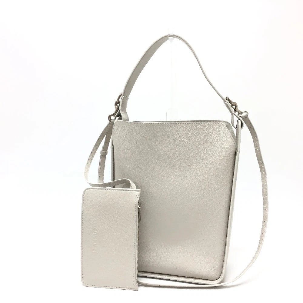 BALENCIAGA NORTH SOUTH 2WAY BAG SHOULDER BAG: BALENCIAGA North South 2WAY bag Shoulder Bag Brand: BALENCIAGA Type/Style: Shoulder Bag Material: Leather Color: White / SilverHardware Size: W8.7xH11.8xD4.5inch / W22cmxH30cmxD11.5cm Accessories:
