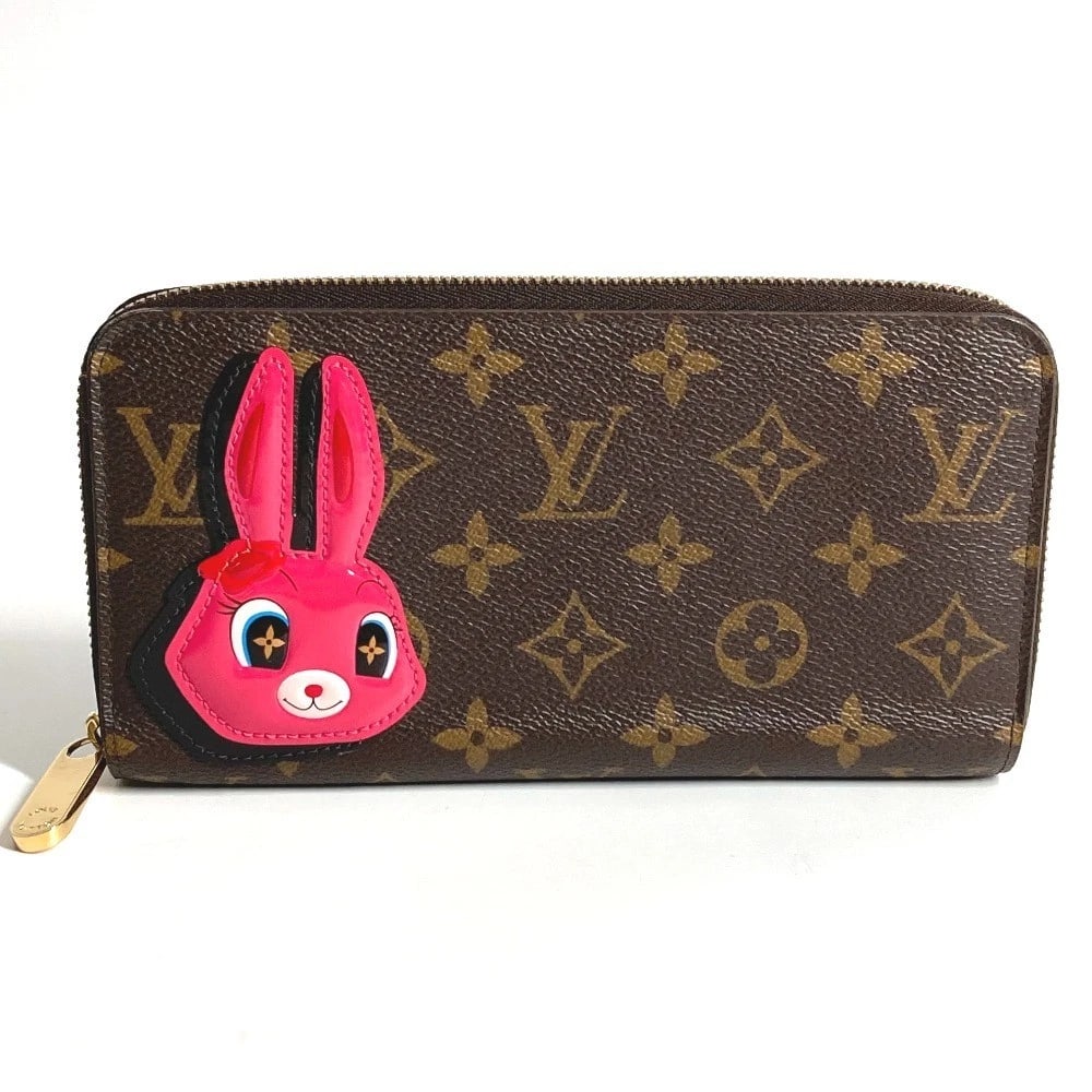 LOUIS VUITTON MONOGRAM NICOLAS GHESQUIERE ZIPPY-WALLET: LOUIS VUITTON Monogram Nicolas Ghesquiere Zippy-wallet Brand: LOUIS VUITTON Type/Style: Long Wallet Material: Monogram Canvas Color: Brownxpink Size: W7.7xH3.9inch / W19.5cmxH10cm Accessories: Non