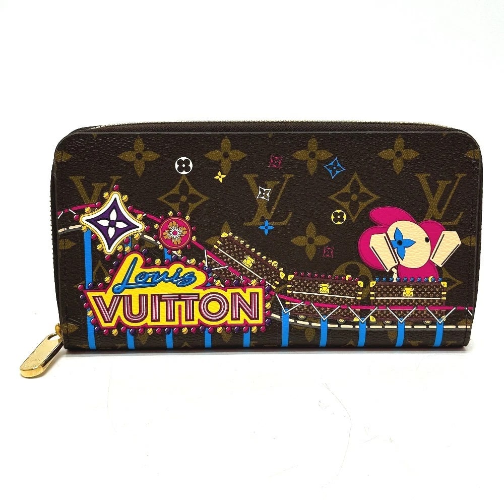 LOUIS VUITTON MONOGRAM VIVIENNE AMUSET PARK ZIPPY WALLET: LOUIS VUITTON Monogram Vivienne Amuset Park Zippy Wallet Brand: LOUIS VUITTON Type/Style: Long Wallet Material: Monogram Canvas Color: Brown Size: W7.3xH3.9inch / W18.5cmxH10cm Accessories: None <