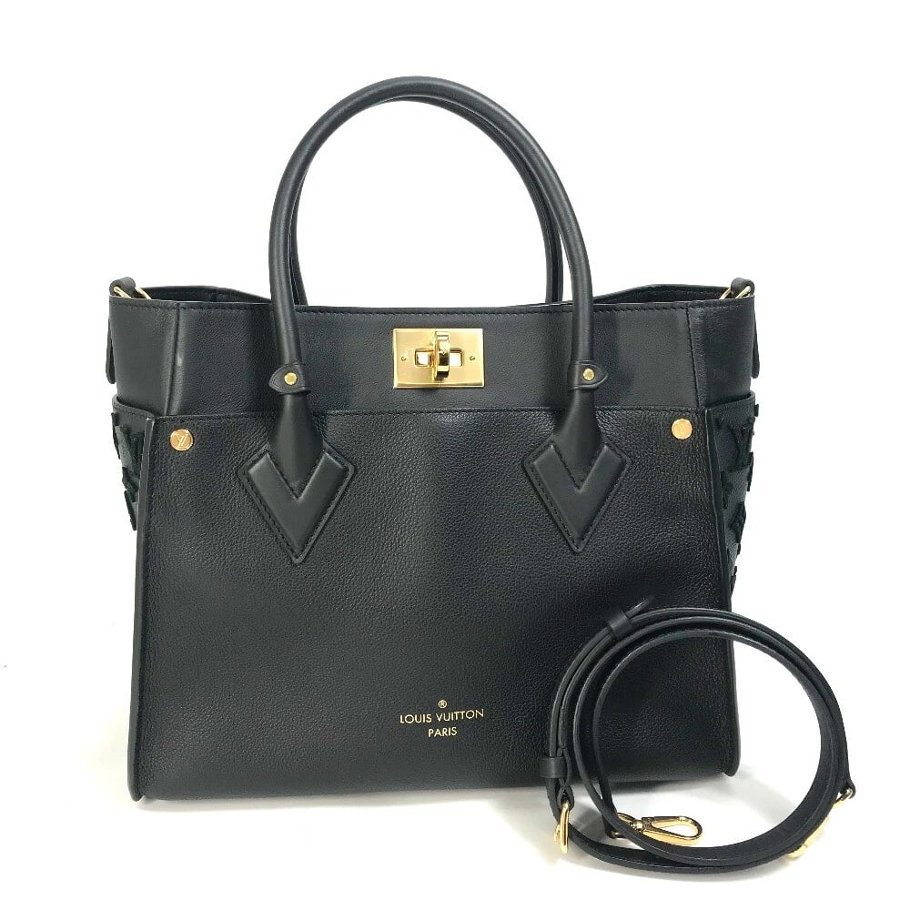 LOUIS VUITTON MONOGRAM TOUGHAGE: LOUIS VUITTON Monogram toughage Brand: LOUIS VUITTON Type/Style: Hand Bag Material: Leather Color: Black x Gold Hardware Size: W12.0xH9.8xD5.1inch / W30.5cmxH25cmxD13cm Accessories: None A