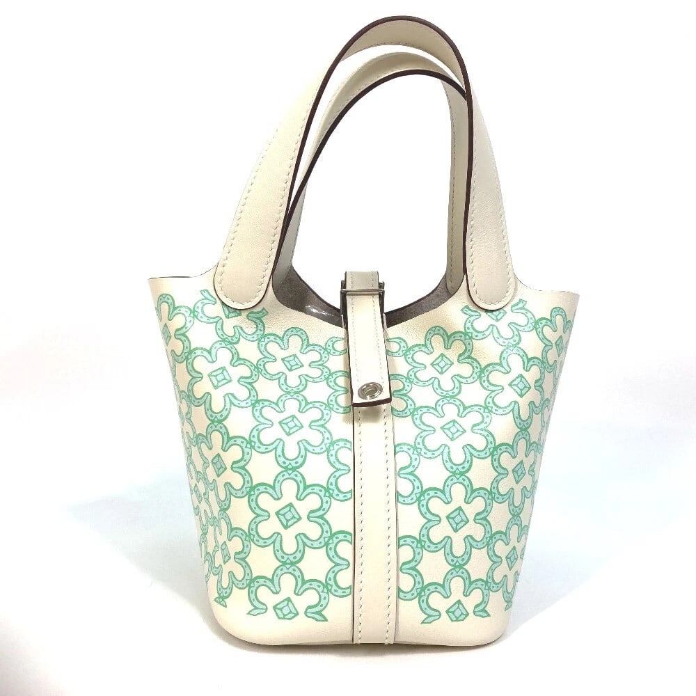 HERMES PICOTINLOCK MICRO MICRO 14 LUCKY DAISY HAND BAG: HERMES PicotinLock micro micro 14 lucky daisy Hand Bag Brand: HERMES Type/Style: Hand Bag Material: swift Color: Green x silver Hardware Size: W4.9xH5.1xD3.9inch / W12.5cmxH13cmxD10cm Handle: 9.8inch 