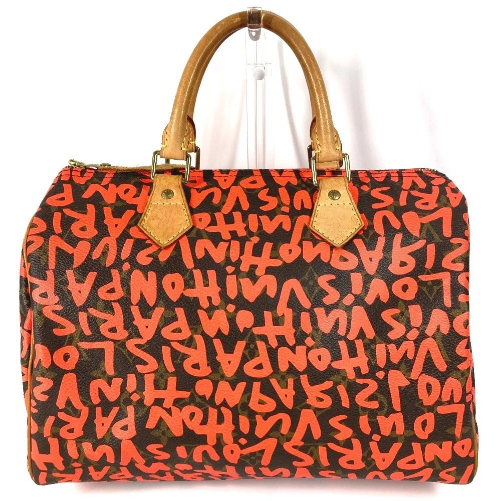 LOUIS VUITTON MONOGRAMGRAFFITI SPEEDY30 HANDBAG: LOUIS VUITTON MonogramGraffiti Speedy30 Handbag Brand: Outlet Type/Style: Duffle bag Material: Monogram graffiti Canvas Color: Orange Size: W11.8xH7.9xD6.5inch / W30cmxH20cmxD16.5cm Accessories: N