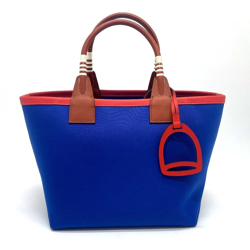 HERMES STEEPLE 25 BAG HAND BAG: HERMES Steeple 25 Bag Hand Bag Brand: HERMES Type/Style: Hand Bag Material: Toile H / Vo Swift Color: Blue Size: W9.8xH9.1xD5.9inch / W25cmxH23cmxD15cm Accessories: None Accessories Notice: When